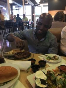 Bongani, enjoying his first American steak!